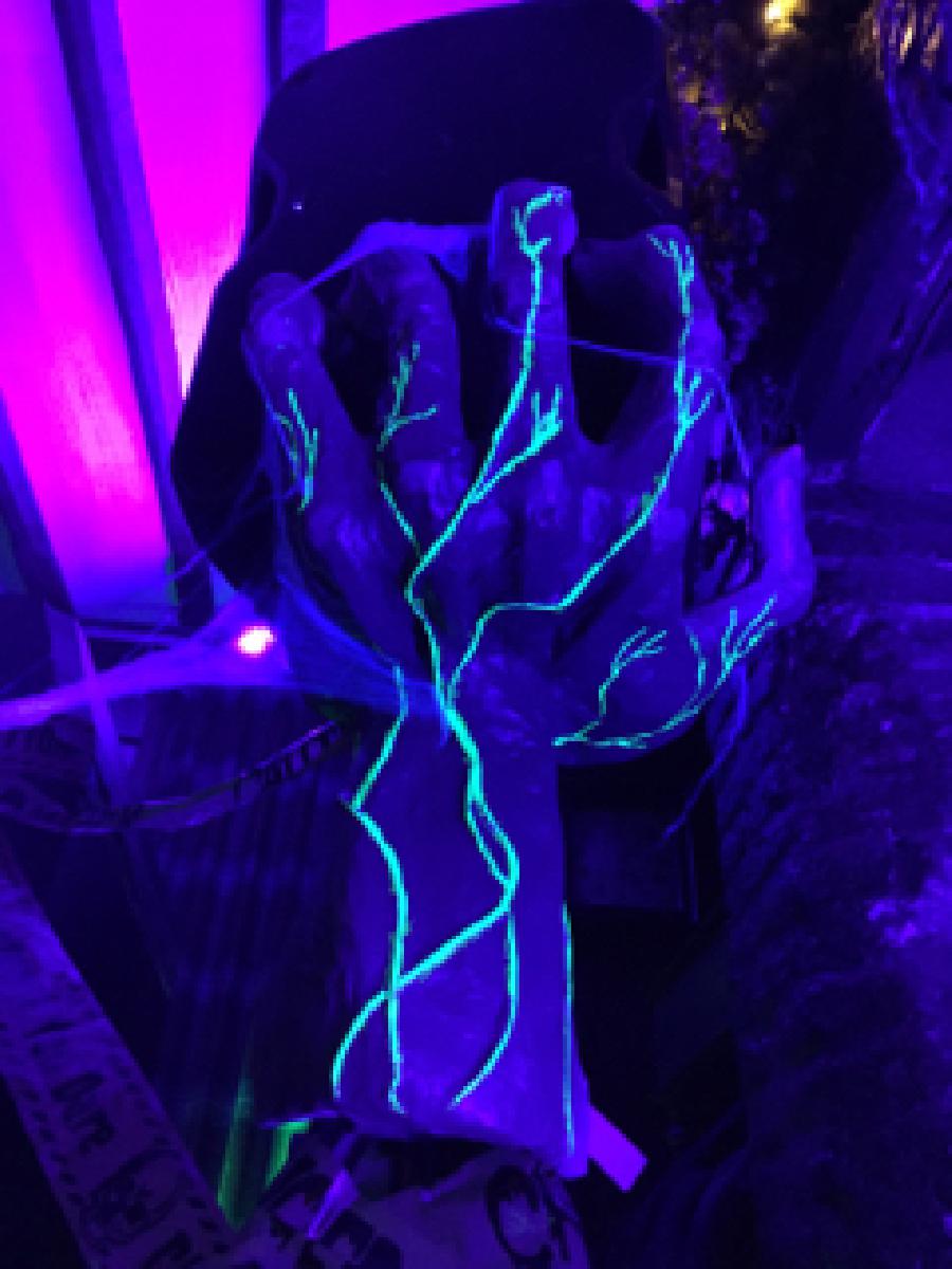 Monster hand props for halloween
                   with ultraviolet veins