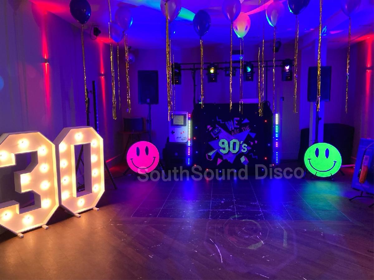 90s music themed party with effects and visual props