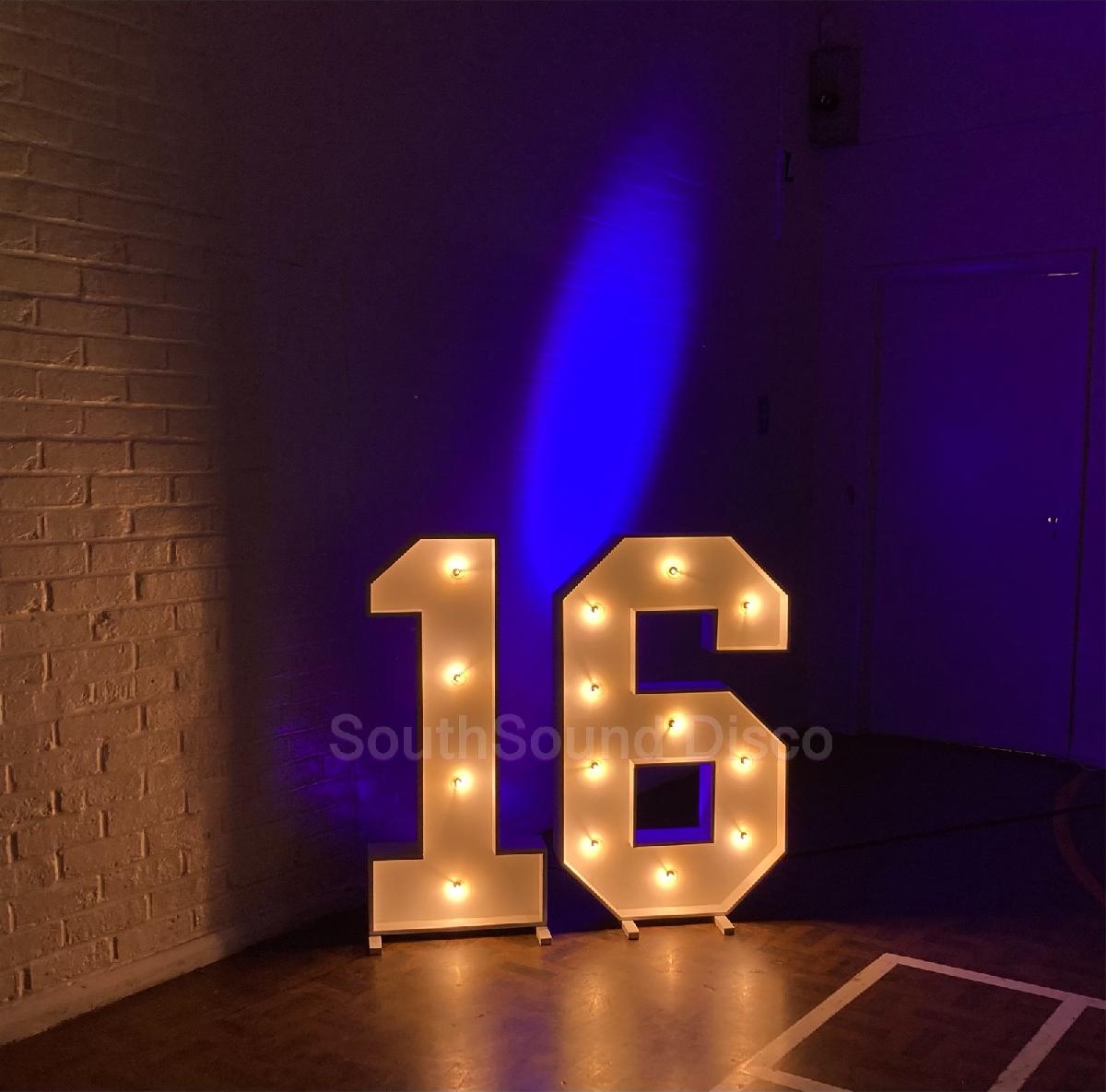Marquee Birthday Number Hire with blue lighting